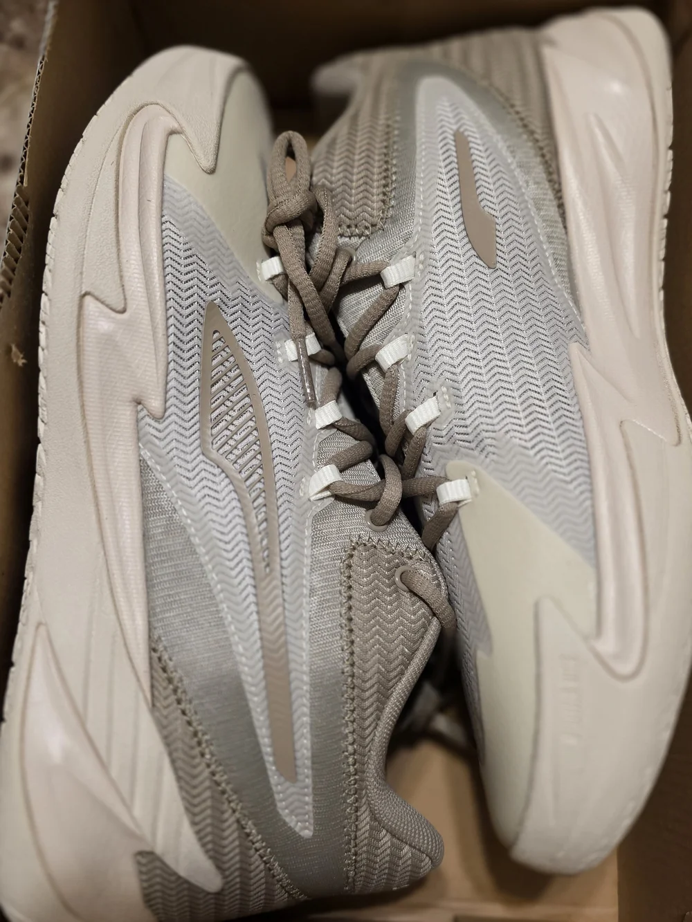 New Puma Men's Dagger basketball shoes in the Alpine Snow/Ice Coffee colorway